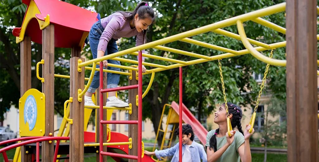 Children enjoying the outdoor play area